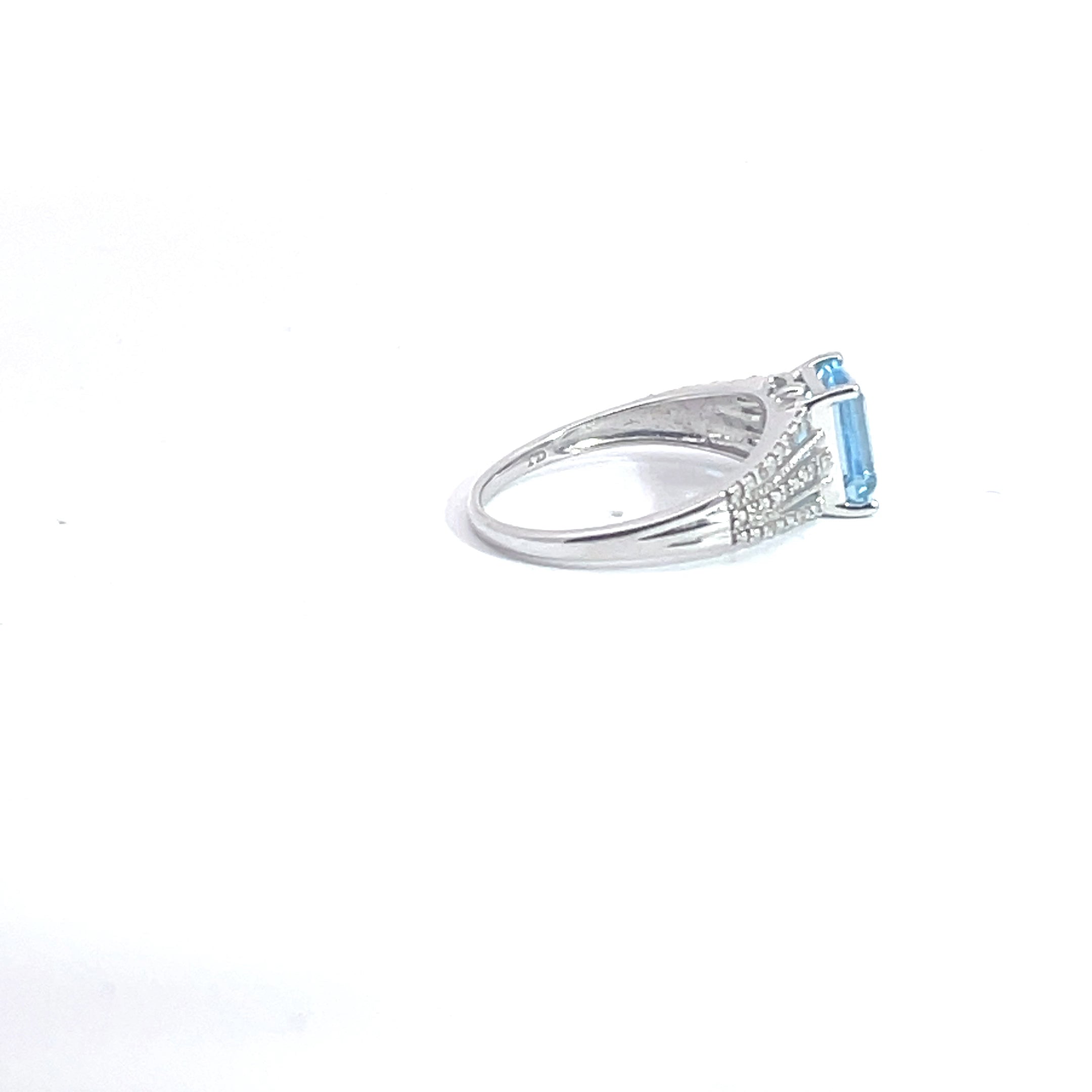 Blue Topaz and Diamond Ring set in 14K White Gold, 7