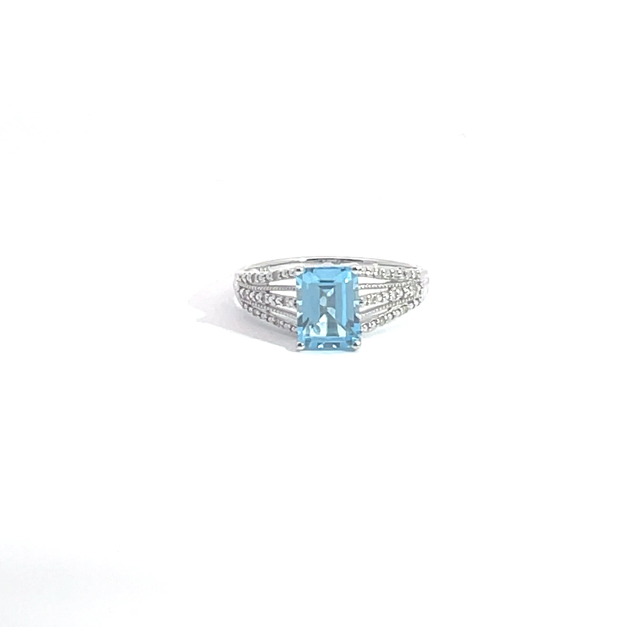 Blue Topaz and Diamond Ring set in 14K White Gold, 7