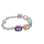 Load image into Gallery viewer, Peridot, Amethyst, Topoaz and Citrine Bracelet set in Sterling Silver
