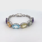 Load and play video in Gallery viewer, Peridot, Amethyst, Topoaz and Citrine Bracelet set in Sterling Silver

