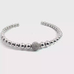 Load and play video in Gallery viewer, Sterling Silver and Diamond Ball Cuff

